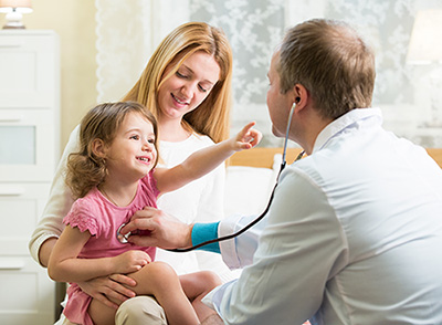 a doctor performing a home visit